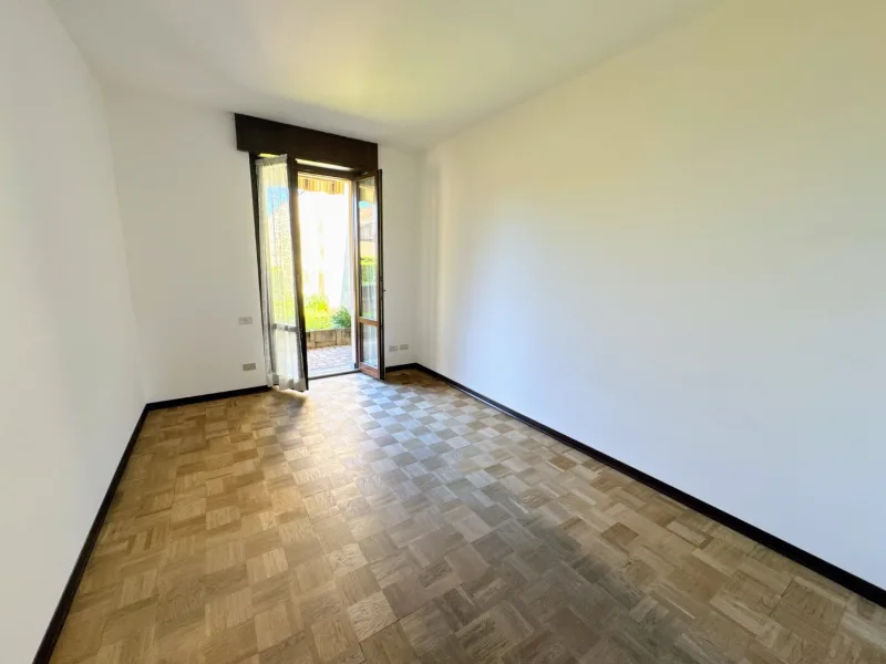 Trilocale con giardino e box doppio — foto 15